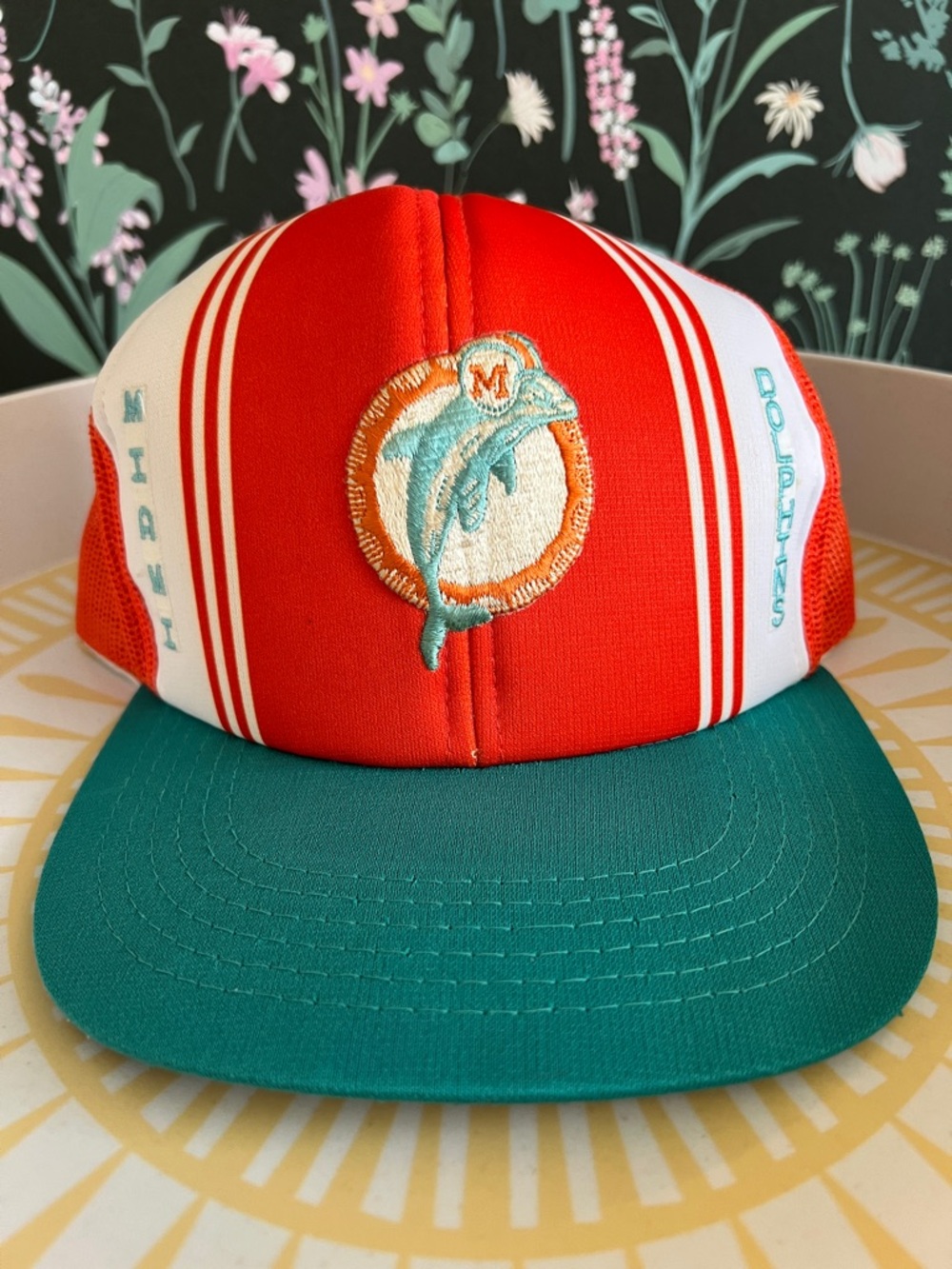VINTAGE 1980s Miami Dolphins "Lucky Stripes" trucker hat featuring a mesh back